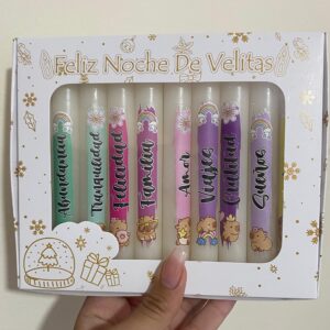 Velitas con temática capibara y deseos navideños